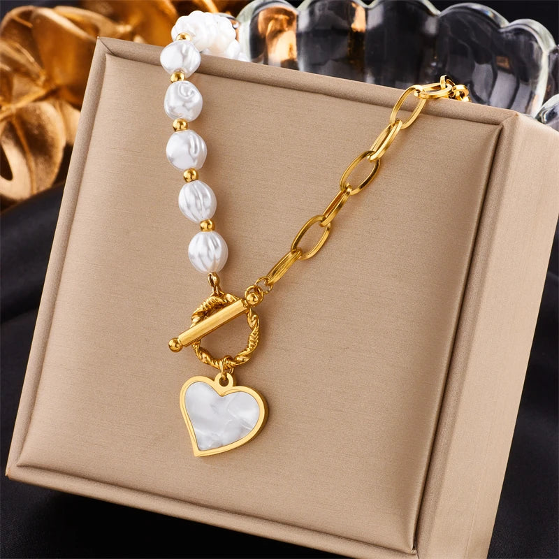 Celeste Necklace — faux pearl and marble heart gold chain necklace by Élan by AKI