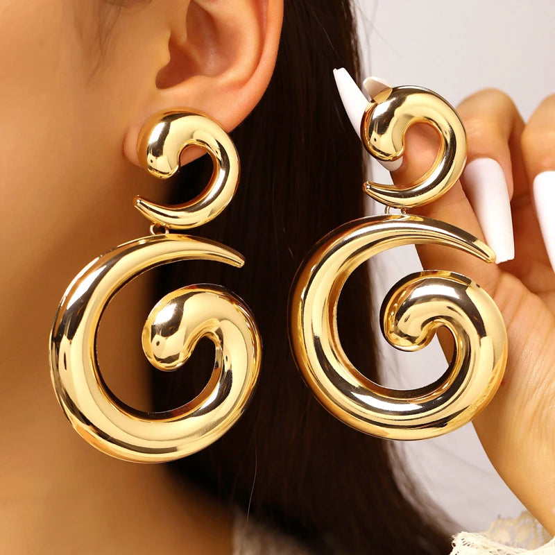 Mira Earrings – Sculptural Spiral Drop Earrings in Gold | ÉLAN by AKI