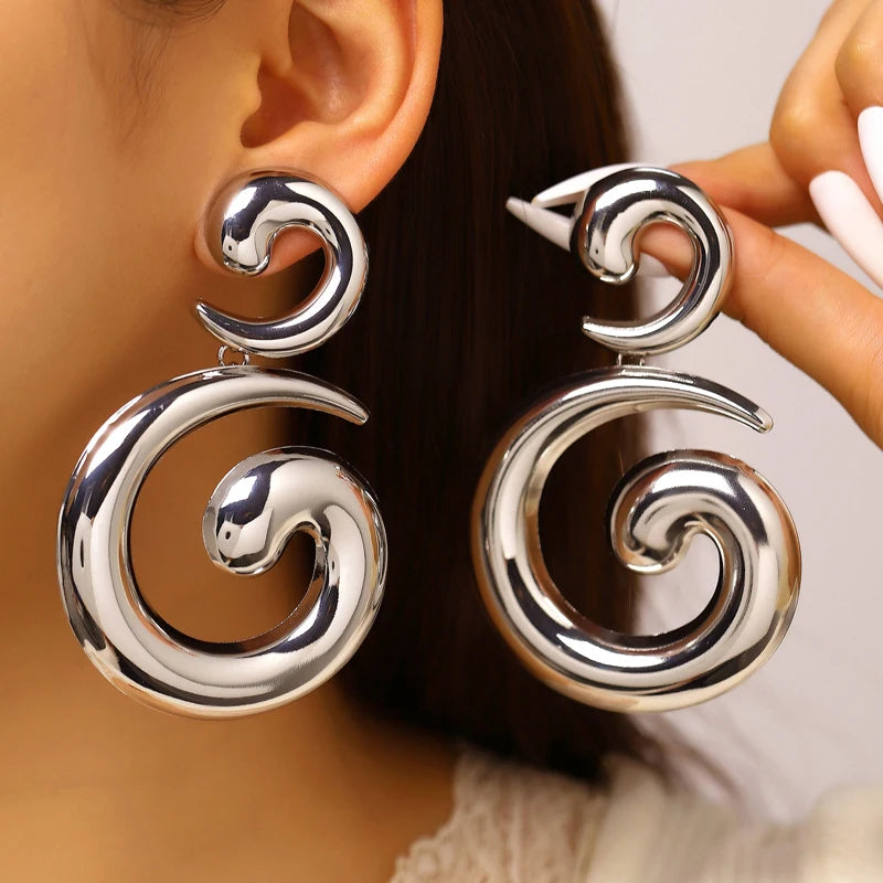 Mira Earrings – Sculptural Spiral Drop Earrings in Silver | ÉLAN by AKI
