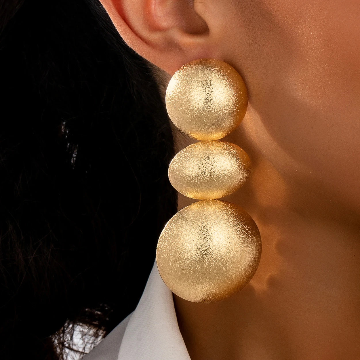 Mona Earrings in Frosted Gold-color finish – 18k gold-tone double hoop drop earrings by ÉLAN by AKI