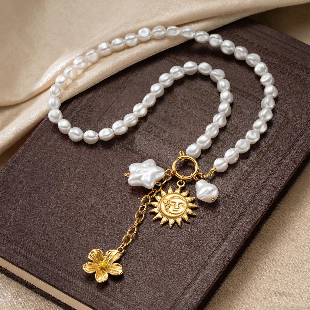 Opaline Necklace — pearl bead and gold celestial charm necklace by Élan by AKI