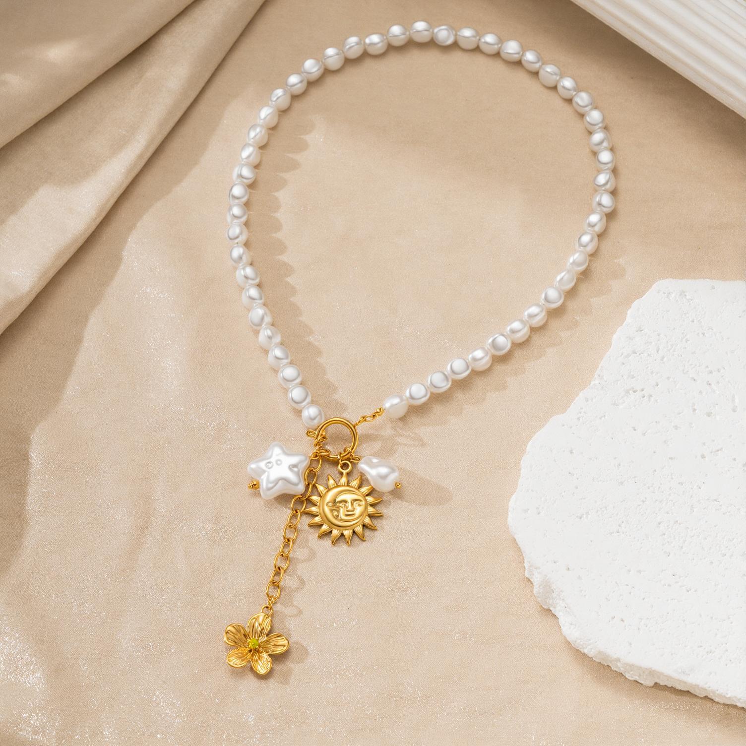 Opaline Necklace — pearl bead and gold celestial charm necklace by Élan by AKI