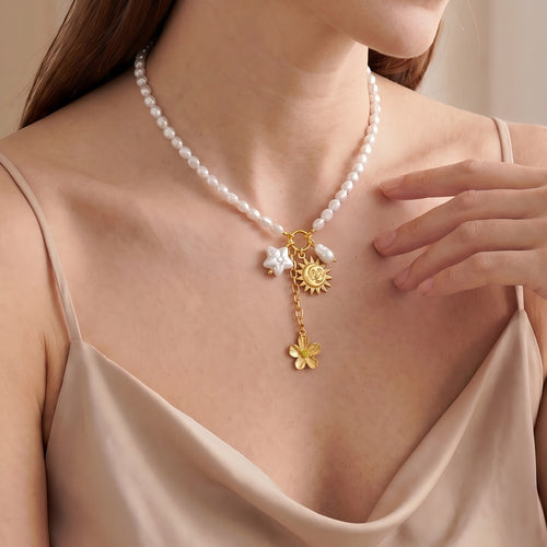 Opaline Necklace — pearl bead and gold celestial charm necklace by Élan by AKI
