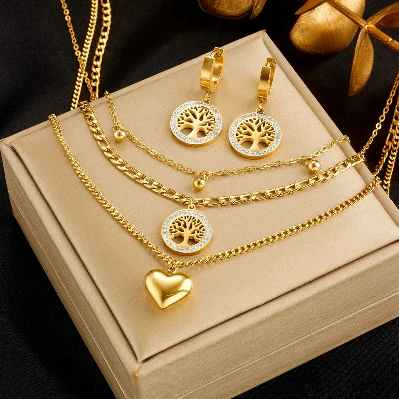 Vida Set — gold Tree of Life drop earrings and layered pendant necklace by Élan by AKI
